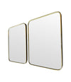 A lovely pair of 1950s Italian brass framed mirrors with solid wood backs