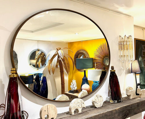 A large orignal Italian 1960s oval brass framed mirror