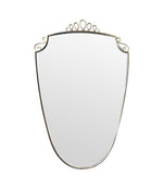 An orignal pair of 1950s Gio Ponti style Italian portrait brass framed mirror with brass top scroll detailing