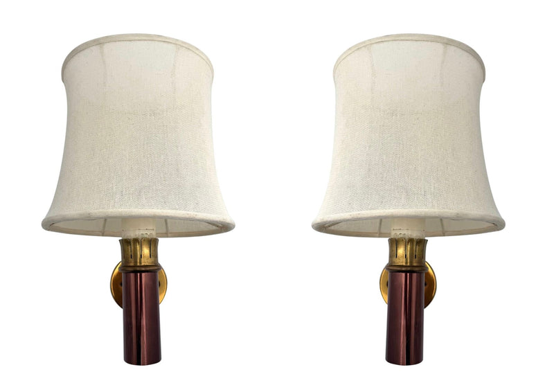 A rare pair of orignal 1960s copper and brass wall sconces by Stilnovo, with orignal labels