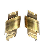 A pair of Danish 1960s torch cut brass wall sconces by Holm Sorensen.