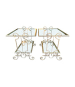 A pair of 1950s gilt wrought iron French side tables, with glass shelves