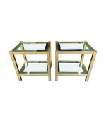 A pair of French 1970s gilt metal side tables by Pierre Vandel with original part mirrored glass shelves