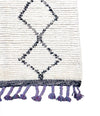 A large handwoven Moroccan Beni Ourain wool berber rug with tribal diamond and line pattern