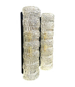 A pair of 1960s clear geometric textured glass wall lights