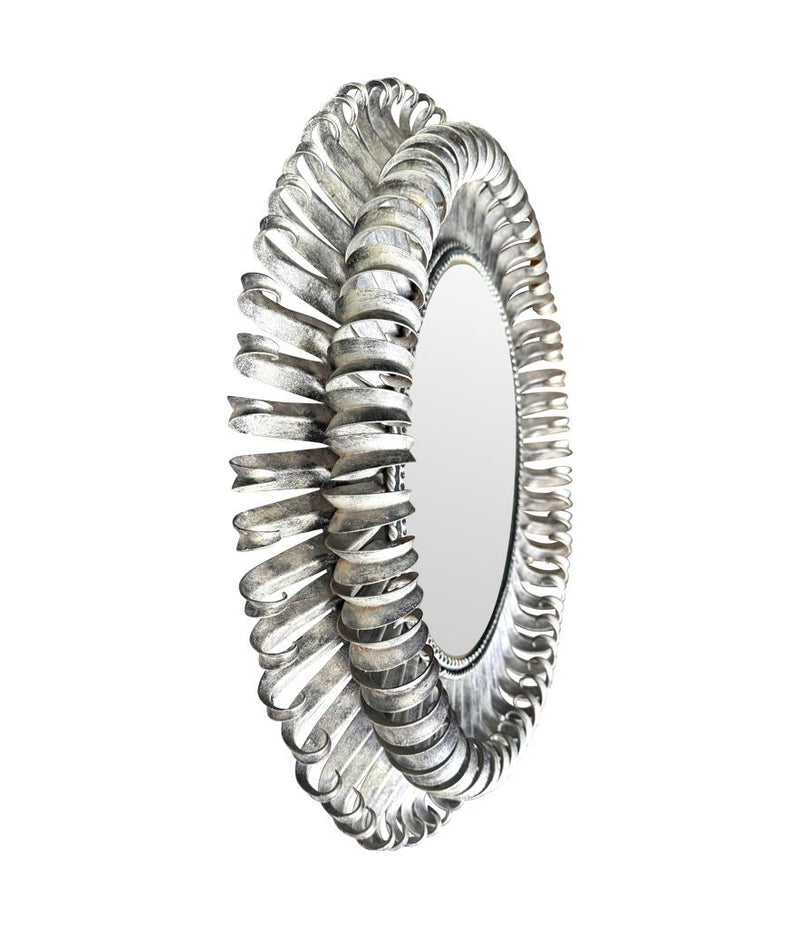 A Spanish 1960s silvered metal landscape or portrait oval eyelash mirror