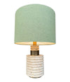 A large Fratelli Manneli ribbed Italian 1970s travertine lamp with brass detail