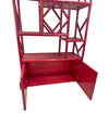 An Italian 1970s burgundy red bamboo shelving unit by Vivai del Sud