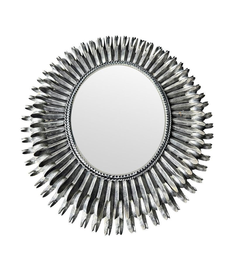 A Spanish 1960s silvered metal landscape or portrait oval eyelash mirror