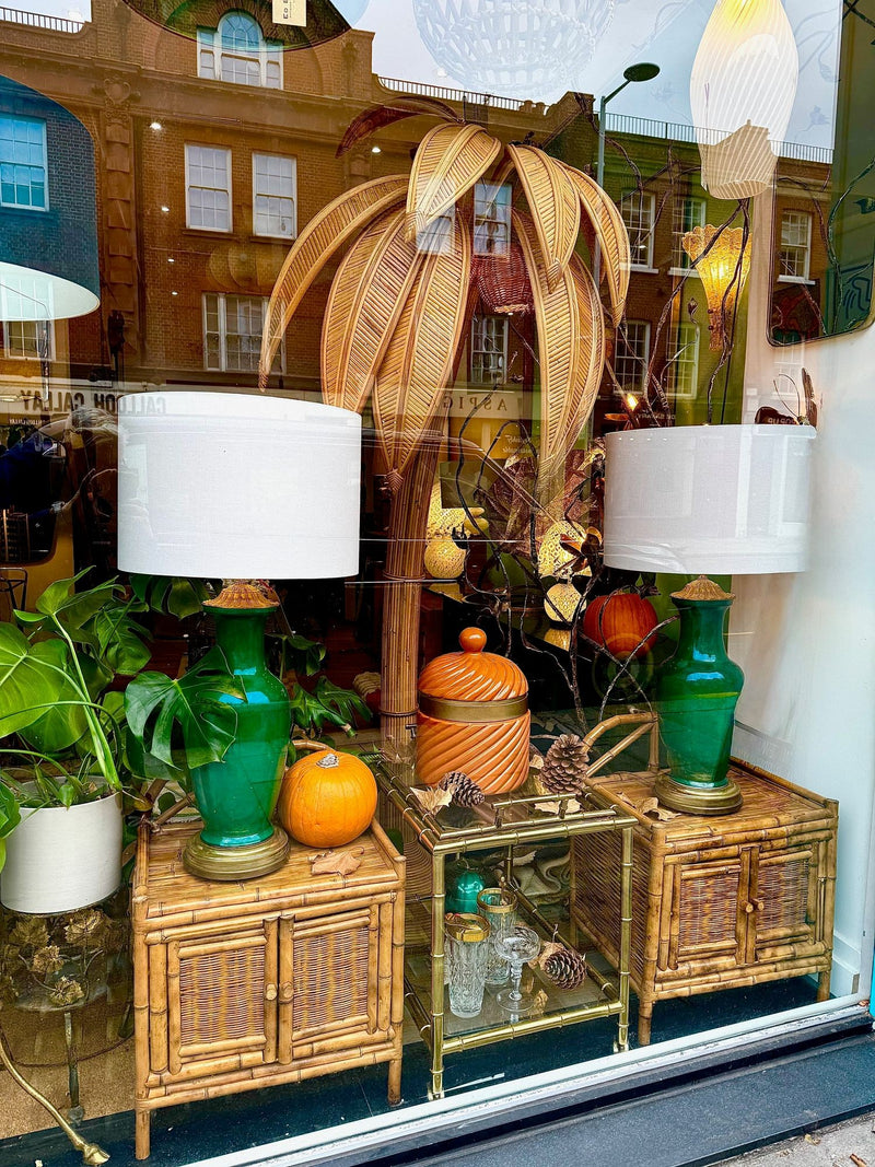 A pair of Italian 1970s Vivai Del Sud style tortoiseshell bamboo bedside tables with two doors