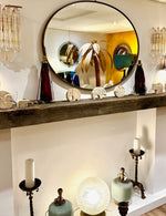A large orignal Italian 1960s oval brass framed mirror