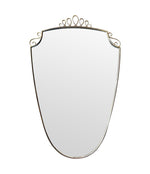 An orignal pair of 1950s Gio Ponti style Italian portrait brass framed mirror with brass top scroll detailing