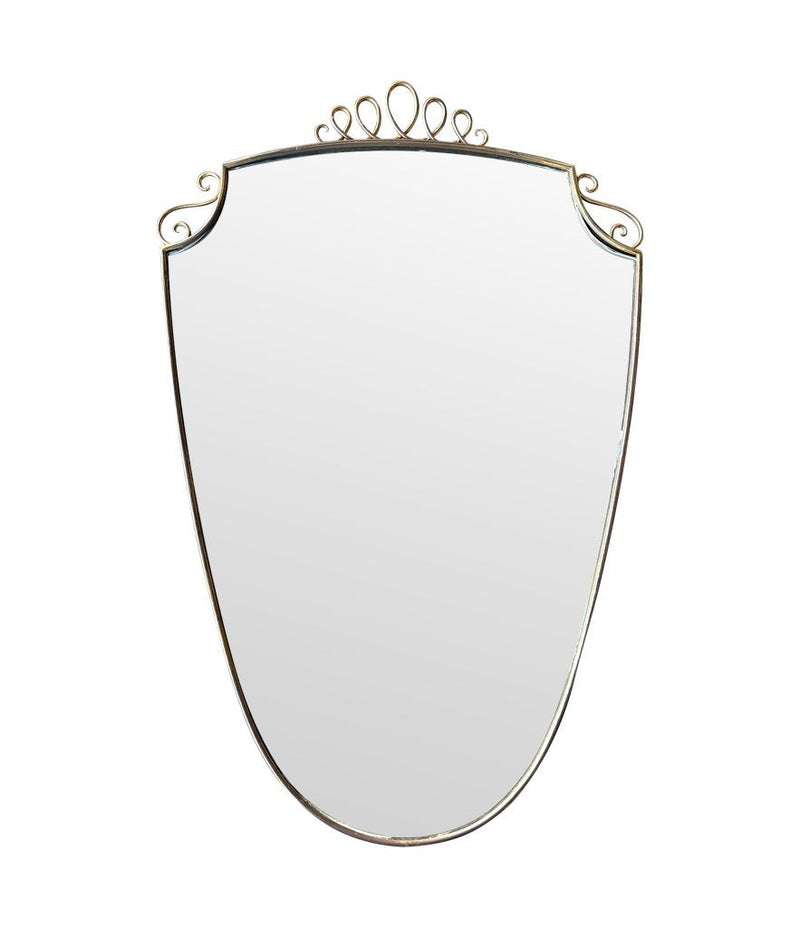 An orignal pair of 1950s Gio Ponti style Italian portrait brass framed mirror with brass top scroll detailing