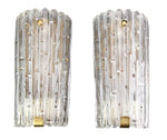 A large pair of Swedish 1960s Orrefors glass and brass wall sconces by Carl Fagerlund