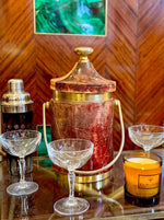 A 1950s French silver plated and ruby cut glass cocktail shaker
