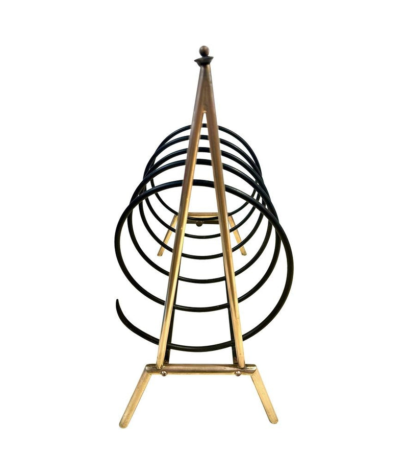 An unusual Italian 1950s mid century brass and black lacquered spiral magazine rack