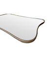 A lovely shaped, orignal Italian 1950s curvaceous brass framed mirror with orignal plate