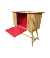 An Italian 1960s bamboo bar cabinet with red laminate top and two stools