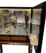 An Italian 1940s mirrored birdseye maple wood and mahogany bar cabinet by Osvaldo Borsani
