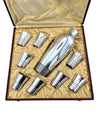 A 1930s Silver plated Art deco cocktail set with silver plated cocktail shaker and eight silver plated shot glasses