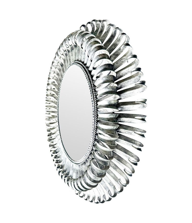 A Spanish 1960s silvered metal landscape or portrait oval eyelash mirror