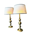 A pair of large Italian 1970s solid brass lamps with orignal satin shades