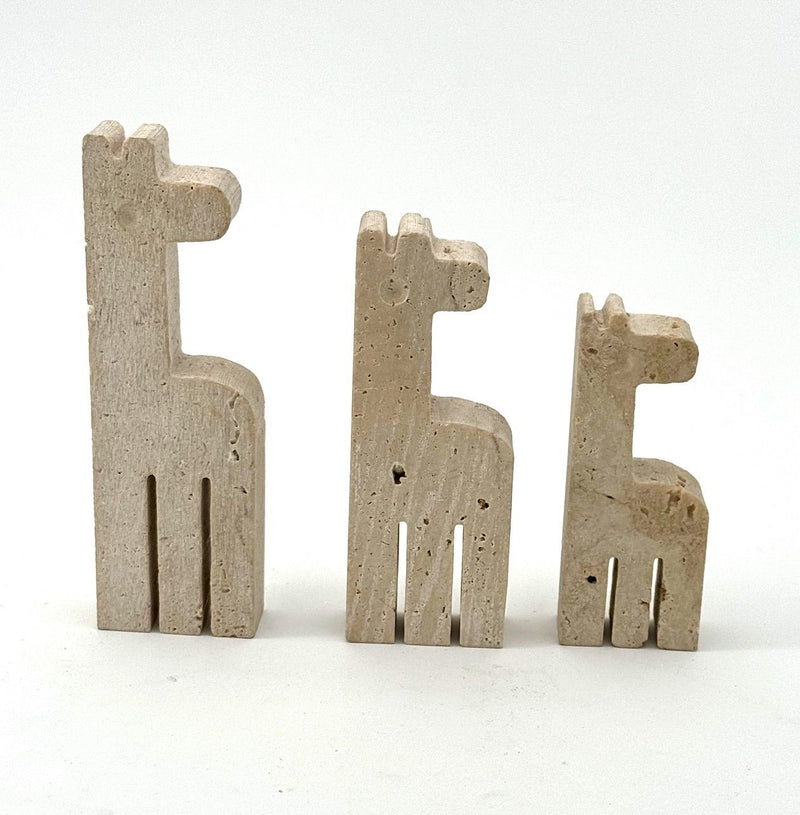 A set of three 1970s Fratelli Mannelli travertine giraffes