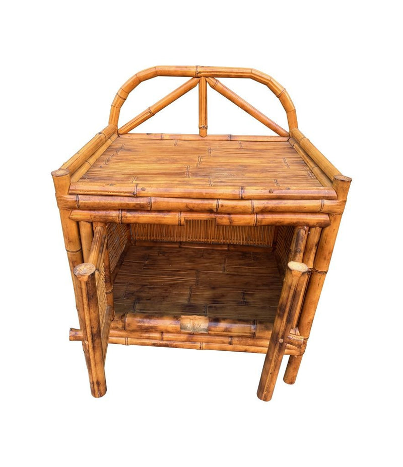 A pair of Italian 1970s Vivai Del Sud style tortoiseshell bamboo bedside tables with two doors