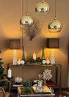 A 1970s Italian solid brass console table with 2 glass shelves