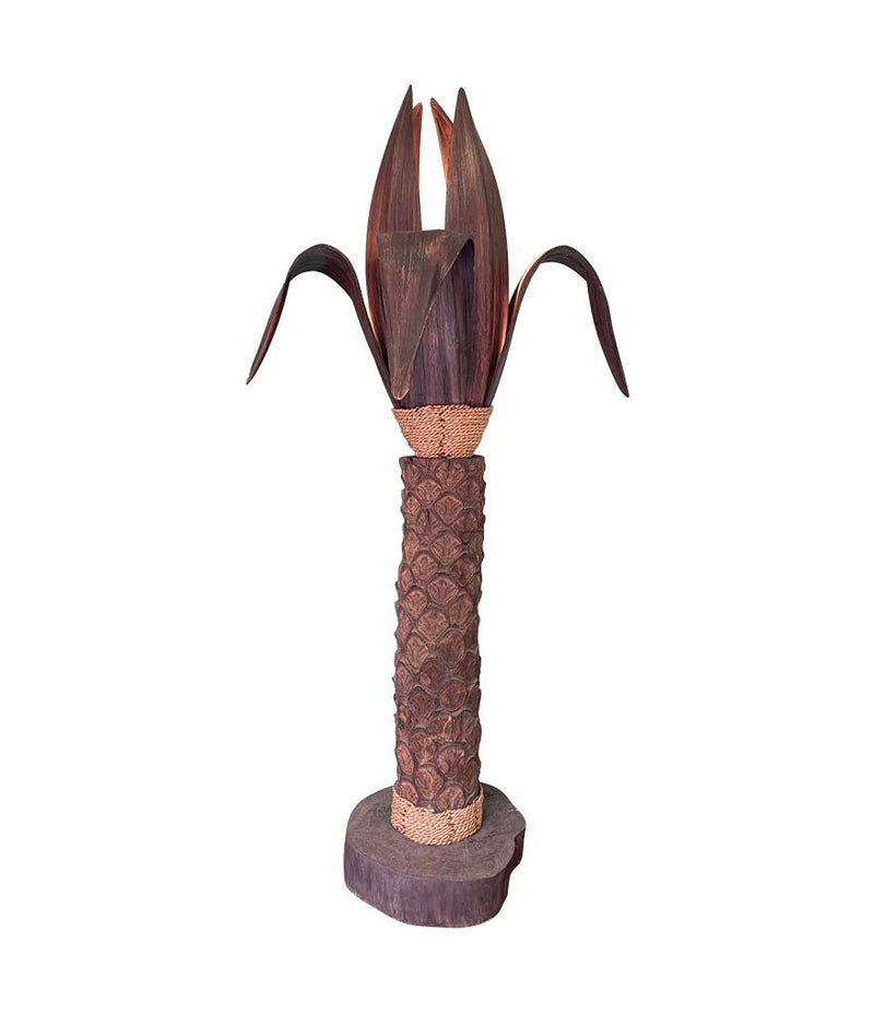 An unusual palm tree floor lamp with real palm trunk wooden base and wooden shaped leaves