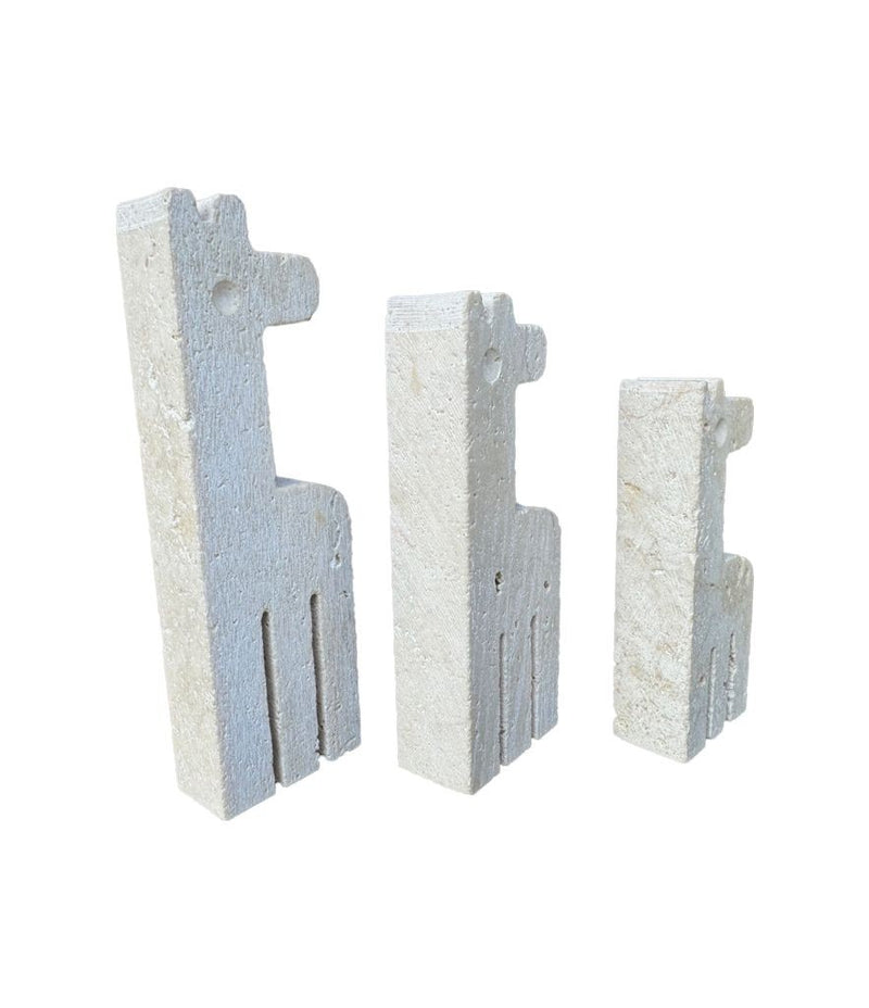 A set of three 1970s Fratelli Mannelli travertine giraffes