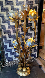 A wonderful 1960s Italian gilt metal flower lamp with seven lights in the flowers