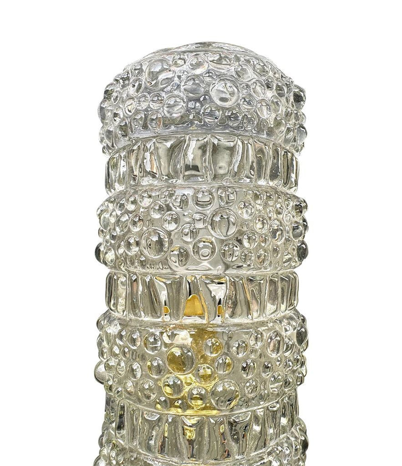 A pair of 1960s clear geometric textured glass wall lights