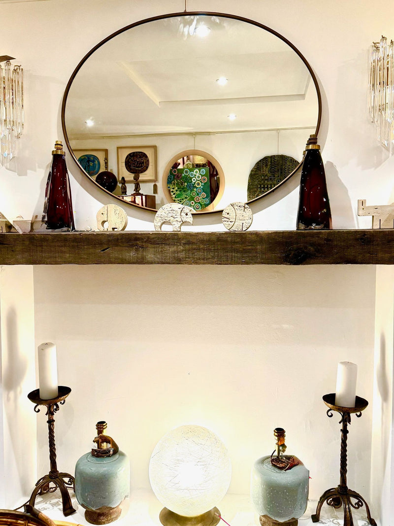 A large orignal Italian 1960s oval brass framed mirror