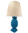 A large Italian 1950s turquoise ceramic pineapple lamp