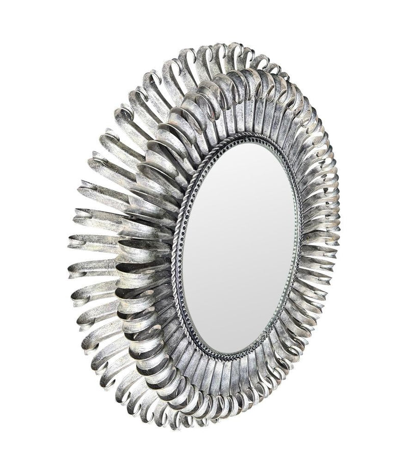 A Spanish 1960s silvered metal landscape or portrait oval eyelash mirror