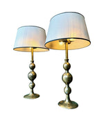 A pair of large Italian 1970s solid brass lamps with orignal satin shades