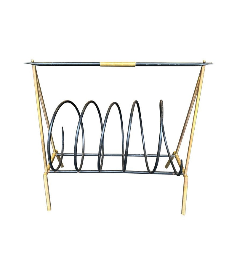 An unusual Italian 1950s mid century brass and black lacquered spiral magazine rack