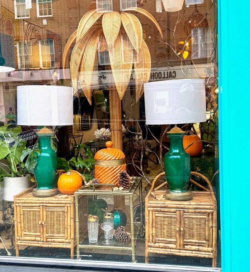 A pair of Italian 1970s Vivai Del Sud style tortoiseshell bamboo bedside tables with two doors
