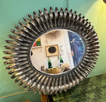 A Spanish 1960s silvered metal landscape or portrait oval eyelash mirror