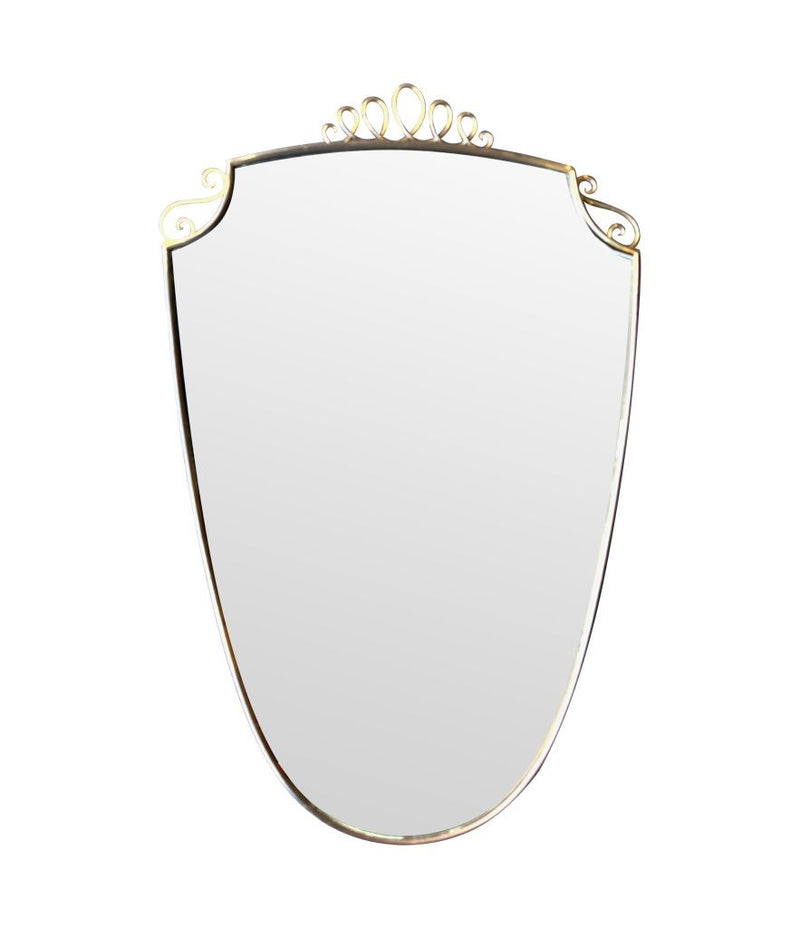 An orignal pair of 1950s Gio Ponti style Italian portrait brass framed mirror with brass top scroll detailing