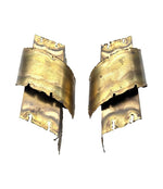 A pair of Danish 1960s torch cut brass wall sconces by Holm Sorensen.