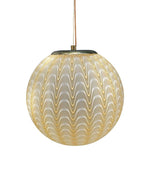 A 1960s Murano glass pendant light attributed to Venini with yellow and white swirl patten