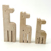 A set of three 1970s Fratelli Mannelli travertine giraffes