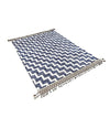 A handmade Morrocan Beni Ourain Berber rug with blue and white stepped design.