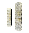A pair of 1960s clear geometric textured glass wall lights