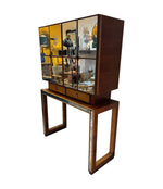 An Italian 1940s mirrored birdseye maple wood and mahogany bar cabinet by Osvaldo Borsani