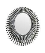A Spanish 1960s silvered metal landscape or portrait oval eyelash mirror