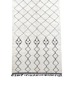 Handwoven Moroccan Berer rug Beni Ourain wool with tribal diamond pattern