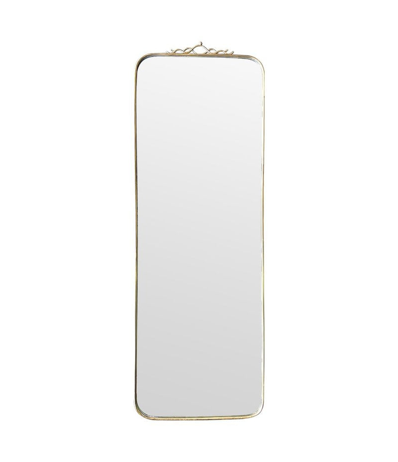 Mid century brass framed mirror with slim profile and scroll top detail